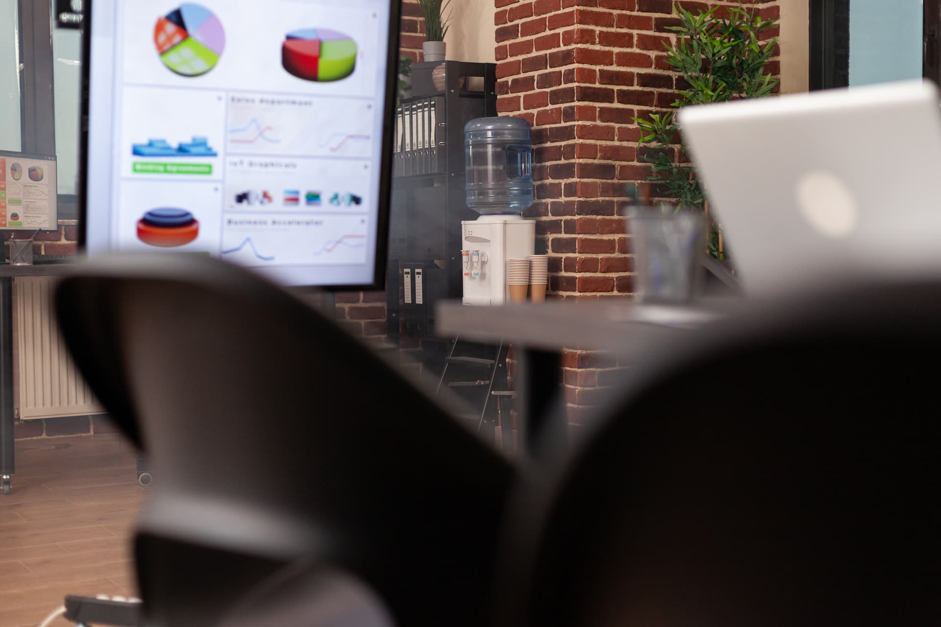 Modern office workspace with team collaborating